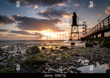 Leuchtturm bei Sonnenuntergang Stockfoto