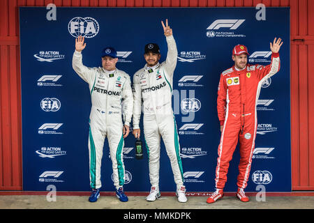 Barcelona, Spanien. 12. Mai, 2018: Valtteri Bottas (FIN), 2., LEWIS HAMILTON (GBR), 1. und SEBASTIAN VETTEL (GER), 3., Grüße der Gast, nachdem er die Pole Position für den Spanischen GP am Circuit de Catalunya in Barcelona - Credit: Matthias Oesterle/Alamy leben Nachrichten Stockfoto