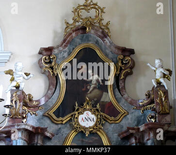 . Français: Elsass, Bas-Rhin, Église Saint-Maurice de Fegersheim (PA 00023146 00132525, IA). Autel secondaire de la Sainte Parenté (1780-1847): Dieses Objekt ist classé Monument Historique in der Basis Palissy, Datenbank der Französische Möbel Erbe des französischen Ministeriums für Kultur, unter den Referenzen PM 67000151 und 67000589, IM, IM, 67000152. Brezhoneg | Deutsch | English | Español | English | Deutsch | Français | Magyar | Italiano | Plattdüütsch | Português | +/- Tableau 'Saint-Antoine" (Inconnu, huile sur toile, XVIIIe). . 26. April 2012. © Ralph Hammann - Wikimedia Commons Fegersheim-St Maur Stockfoto