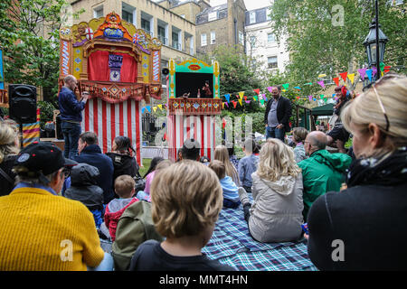 London, UK, 13. Mai 2018 Punch und Judy Enthusiasten aus dem ganzen Land versammelten sich im Garten von St. Paul Kirche in Covent Garden Heute ist der 356. Geburtstag von Herrn Dorn mit traditionellen Puppenspiel und Spaß für die ganze Familie @Paul Quezada-Neiman/Alamy Leben Nachrichten zu feiern. Stockfoto