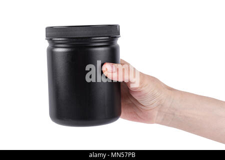 Kunststoff kann in der Hand isoliert auf dem weißen Hintergrund Stockfoto