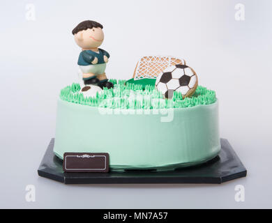 Kuchen oder Fußball-Kuchen auf einem Hintergrund Stockfoto