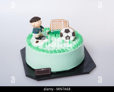 Kuchen oder Fußball-Kuchen auf einem Hintergrund Stockfoto