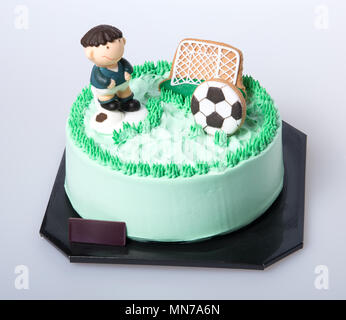 Kuchen oder Fußball-Kuchen auf einem Hintergrund Stockfoto