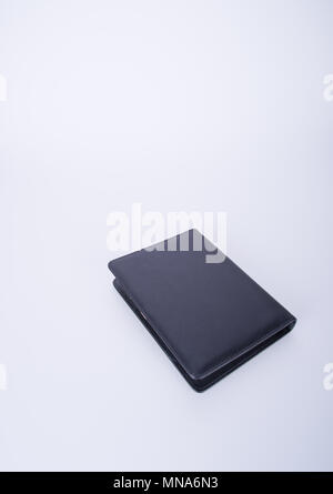 Notebook oder schwarzem Leder Notebook auf dem blackground Stockfoto