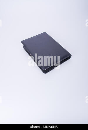 Notebook oder schwarzem Leder Notebook auf dem blackground Stockfoto
