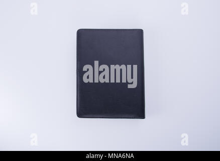 Notebook oder schwarzem Leder Notebook auf dem blackground Stockfoto