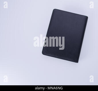 Notebook oder schwarzem Leder Notebook auf dem blackground Stockfoto