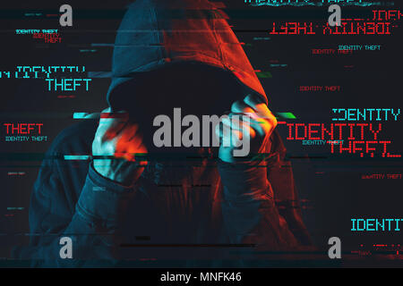 Online-identitätsdiebstahl Konzept mit gesichtslosen Hooded männliche Person, Low Key rot und blau beleuchtete Bild und digitale glitch Wirkung Stockfoto