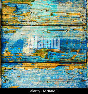 Alte hölzerne Bretter mit Abblättern der blauen Farbe, können als Hintergrund verwendet werden Stockfoto
