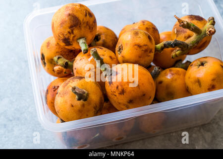 Mispel Pflaume Obst/Eirobotrya Japonica bereit zu essen. Ökologische Lebensmittel. Stockfoto