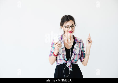 Weibliche Tanz und Musik genießen Stockfoto
