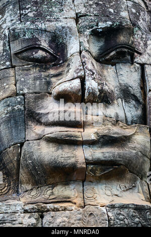 Gesichter der alten Bayon Tempel beliebte Touristenattraktion in Angkor Thom, Siem Reap, Kambodscha. Stockfoto