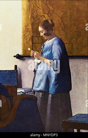 Frau liest einen Brief.[1] Alternative Titel (s): Frau in Blau lesen einen Brief ca. 1662-1663 (1647-1675). 1272 Frau in Blau - Jan Vermeer van Delft Stockfoto