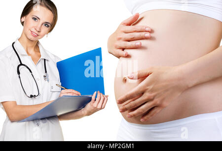 Junge schwangere Frau prüfen, indem Arzt. Stockfoto