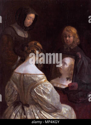 Frau vor einem Spiegel (wahrscheinlich Gesina Ter Borch) * Öl auf Leinwand * 34,5 × 26 cm * 1652 Vrouw voor een Spiegel 1272 Frau vor einem Spiegel, von Gerard Ter Borch (II) Stockfoto