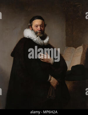 Johannes Wtenbogaert * Öl auf Leinwand * 130 x 103 cm * t unterzeichnet. r.: Rembrandt Ft. / 1633 * Eingeschrieben t. l.:AET: · 76 Portrait von Johannes Wtenbogaert. Portrait von Johannes Wtenbogaert (1557 - 1644), remonstrant Minister, im Alter von 76 Jahren. Stehend, mit halber Länge, Handschuhe in seiner rechten Hand, die linke Hand auf seine Brust. Auf der rechten Seite ein offenes Buch gegen die Wand steht. Vor einer breit angelegten - eingefaßte schwarze Hut platziert ist. 1633. 730 Johannes Wtenbogaert von Rembrandt van Rijn Stockfoto