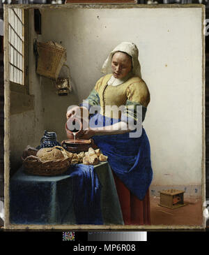 Niederländisch: Het melkmeisje den Milchfrauen. English: Dienstmagd mit Milchkrug. ca. 1660. 730 Johannes Vermeer - Het melkmeisje - rijksmuseum - 001 Stockfoto