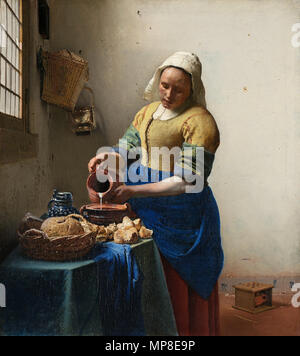 Niederländisch: Het melkmeisje den Milchfrauen. English: Dienstmagd mit Milchkrug. ca. 1660. 730 Johannes Vermeer - Het melkmeisje - Google Kunst Projekt Stockfoto