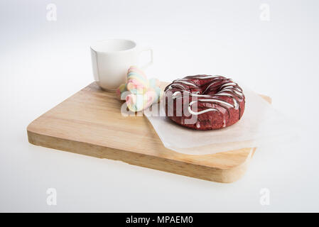 Donut oder Krapfen und Kaffee auf einem Hintergrund Stockfoto