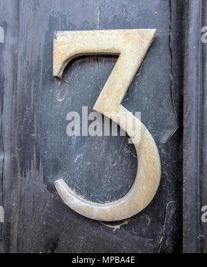 Formulierung in Distressed Zustand Typografie gefunden Nummer Drei 3 geschrieben Stockfoto