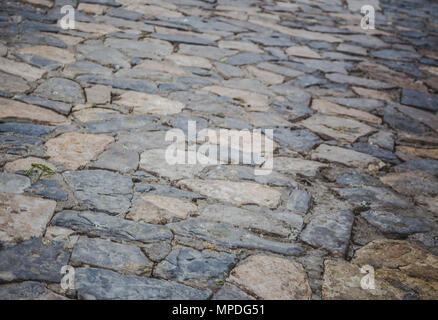 Ungleichmäßige grau und beige Stein Boden ebnet Hintergrund Stockfoto