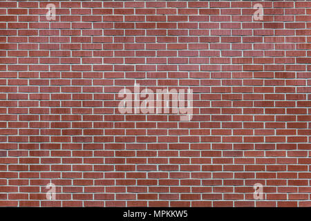 Rote Ziegelwand mit rundem Bindungsmuster Stockfoto