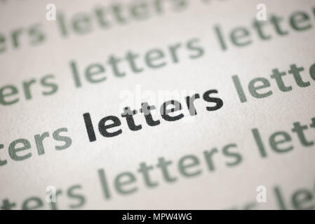 Word Makro Sprache auf weißem Papier gedruckt Stockfoto