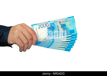 Haufen der Russische Rubel Banknoten in der Hand - auf weißem Hintergrund. 18000 Rubel mit neuen zwei tausend Dollar Rechnungen Stockfoto