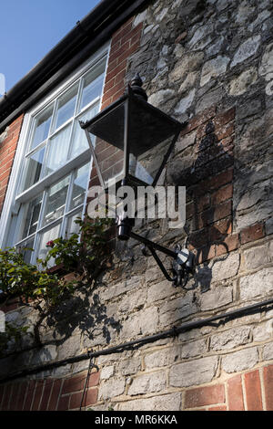 Alte gas Licht Am Millstream Hotel at Bosham, in der Nähe von Chichester, Sussex, UKunlit Stockfoto