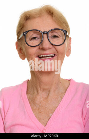 Angesichts der Happy senior Nerd lächelnde Frau beim Tragen von geeky eyeg Stockfoto