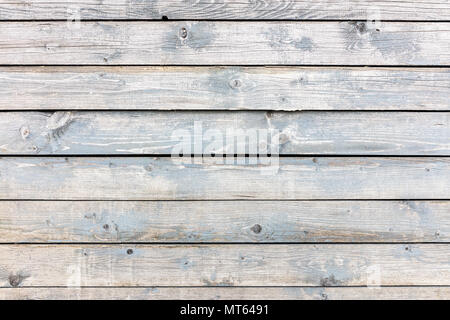 Alte schäbige Holzbohlen mit grauen Farbe lackiert. verwitterte rustikalen Hintergrund Stockfoto