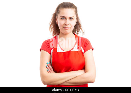 Junge Frau Supermarkt Mitarbeiter oder Lagerhalter mit Händen wie zuversichtlich Arbeiter Geste auf weißem Hintergrund gekreuzt Stockfoto