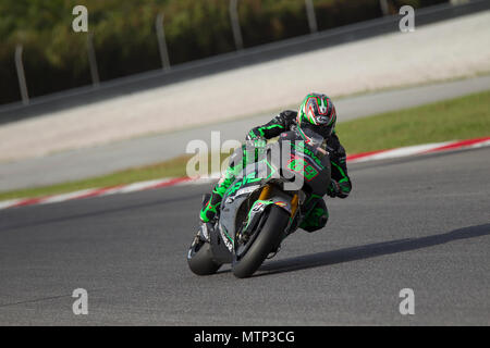 Ehemalige MotoGP-Weltmeister Nicky Hayden rittlings auf seinem Honda RCV factory Bike auf der offiziellen MotoGP winter Test in Sepang in Malaysia. Stockfoto