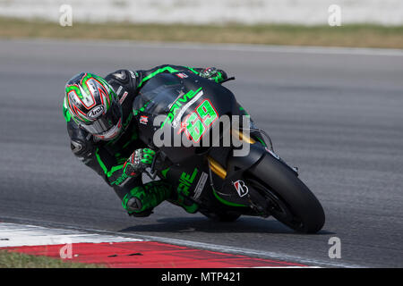 Ehemalige MotoGP-Weltmeister Nicky Hayden rittlings auf seinem Honda RCV factory Bike auf der offiziellen MotoGP winter Test in Sepang in Malaysia. Stockfoto