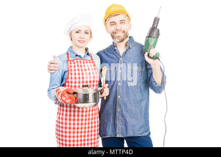 Weibliche Kochen mit Ehemann Stockfoto