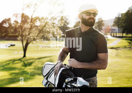 Golf Spieler mit einem Golf Club Golfplatz Stockfoto