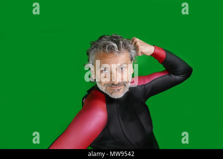 Mann in professionelle Triathlon Anzug, über grüne Bildschirm isoliert Stockfoto
