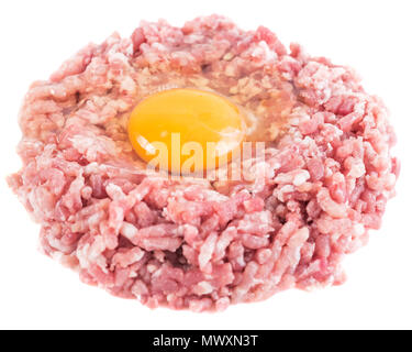 Boden Schnitzel oder hamburger mit Huhn Eigelb auf weißem Hintergrund. Close-up. Stockfoto