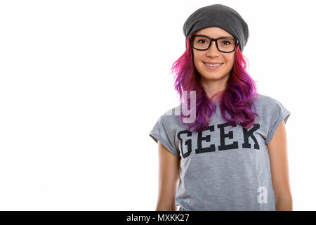 Studio shot von Happy geek Mädchen lächelnd beim Tragen von Brillen Stockfoto