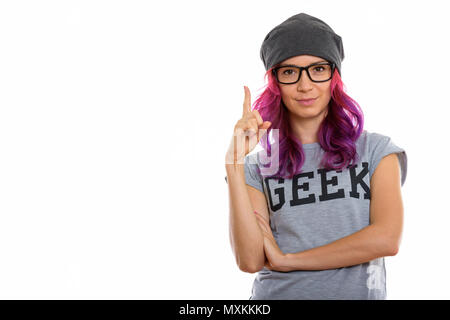 Studio shot von Geek Girl zeigt mit dem Finger auf Stockfoto