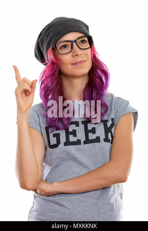 Studio shot von Geek Girl Pointing Finger beim Denken Stockfoto