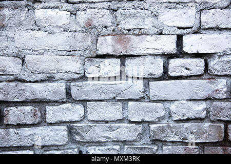 Einfache, weiße und graue Wand gemalt mit metallischen Versprüht Tinte Farbe als nahtlose Muster Textur Hintergrund. Stockfoto