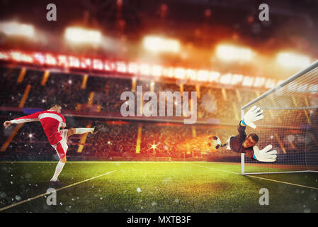 Fußball Stürmer schlägt die Kugel mit genug Leistung, um am Feuer zu gehen Stockfoto