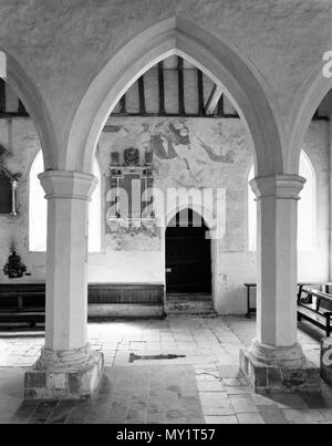 Überreste eines C 15 (c 1480) Wandgemälde im S Gang von Albury Park Kirche, Surrey: head & shoulders St. Christophorus mit dem Jesuskind. Stockfoto