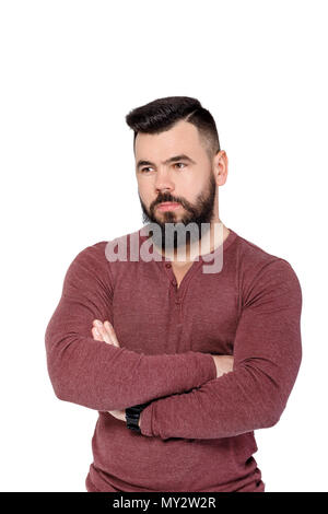 Portrait von gutaussehenden jungen Ernst bärtiger Mann auf weißem Hintergrund Stockfoto