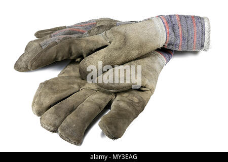 Verwendet Arbeitshandschuhe auf weißem Hintergrund Stockfoto
