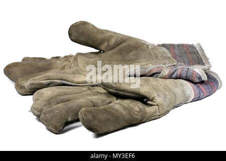 Verwendet Arbeitshandschuhe auf weißem Hintergrund Stockfoto
