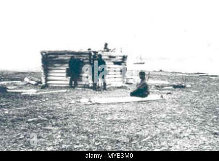 . Nederlands: Het Behouden Huys 1881 tijdens de Nederlandse expeditie naar het gebied tijdens het Eerste Internationale Pooljaar. (Het ist de vraag des dit daadwerkelijk het Behouden Huys ist. Dat war namelijk 6 m. Rasse en 10 m. lang en Bij De Vondst 1871 Al behoorlijk ingestort. Bovendien meldt Zeeberg, J.J. (2007) - s. 87 dat deze Expeditie het Behouden Huys nicht heeft Weten te bereiken. [Zeeberg J.J. (2007) Terugkeer naar Nova Zembla: De laatste en tragische Reis van Willem Barents. Walburg Pers]) Foto einer Kabine der Datum unbekannt, Baumeister, oder Standort anmelden. Die Beschriftung auf der Websit Stockfoto