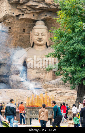 Daton, Daton, China. 6. Juni, 2018. Datong, China, 6. Juni 2018: Die yungang Grotten, früher Wuzhoushan Grotten, sind alte chinesische buddhistische Tempel, Grotten in der Nähe der Stadt Datong in der Provinz Shanxi. Sie sind ausgezeichnete Beispiele für die aus dem Felsen gehauenen Architektur und einer der drei berühmtesten antiken Buddhistischen skulpturale Websites von China. Die anderen sind Longmen und Mogao. Credit: SIPA Asien/ZUMA Draht/Alamy leben Nachrichten Stockfoto